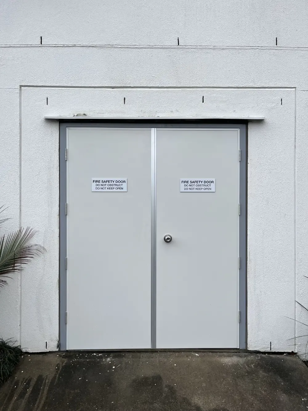 Fire door frame before and after repair