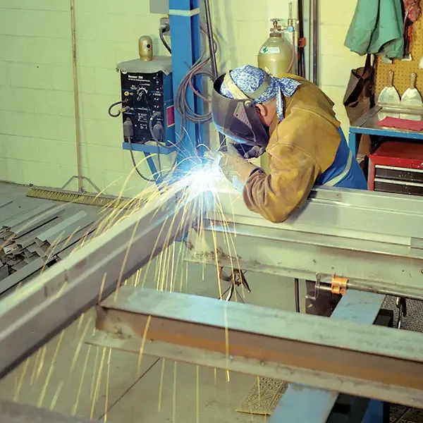 AAFD welder fabricating fire door frame